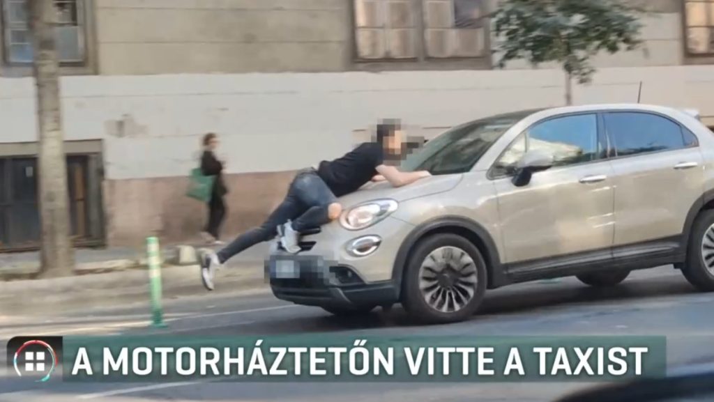 Az Üllői úton nő több mint száz méteren át vitte a motorháztetőn utazó taxisofőrt